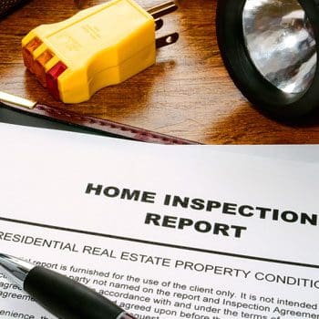 A home inspection report and light on top of the table.